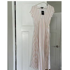 White maxi dress with light orange stripes